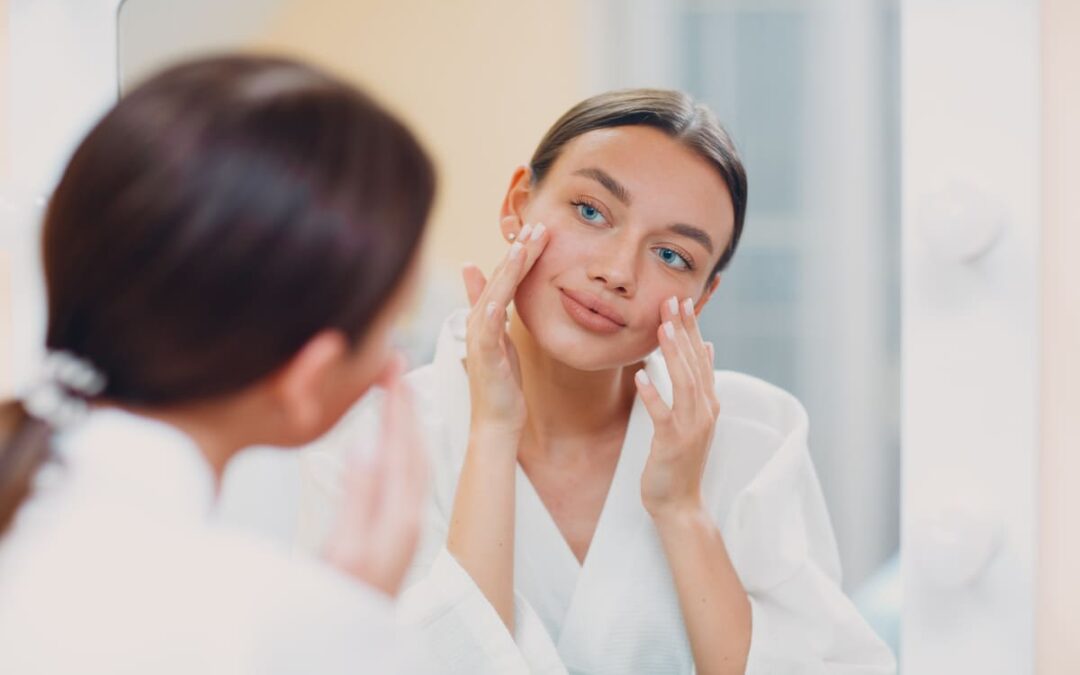 woman inspecting face