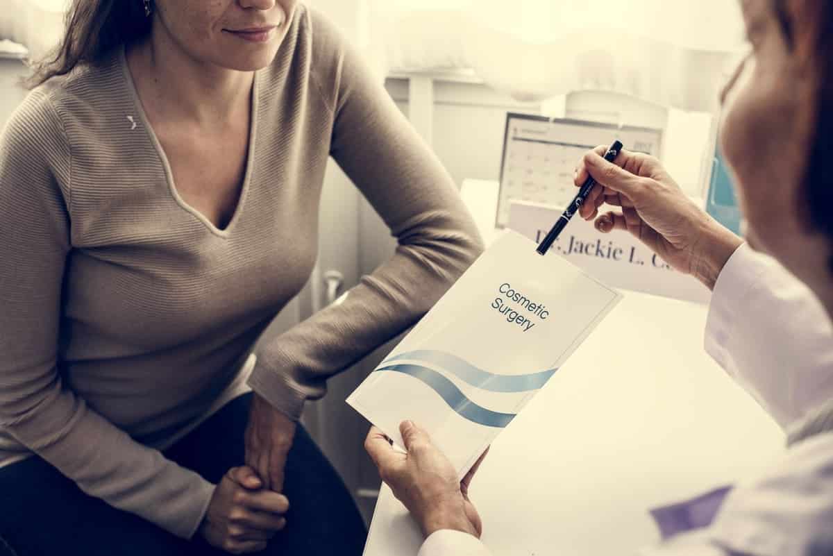 woman reviewing papers