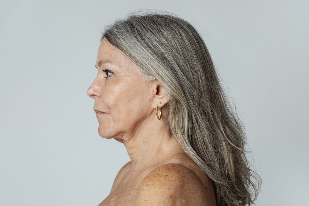 close up portrait of woman with grey hair